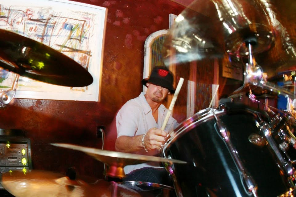 Behind the drum kit